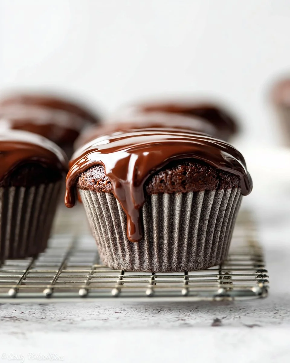 Delicious chocolate ganache topping on a decadent cake.